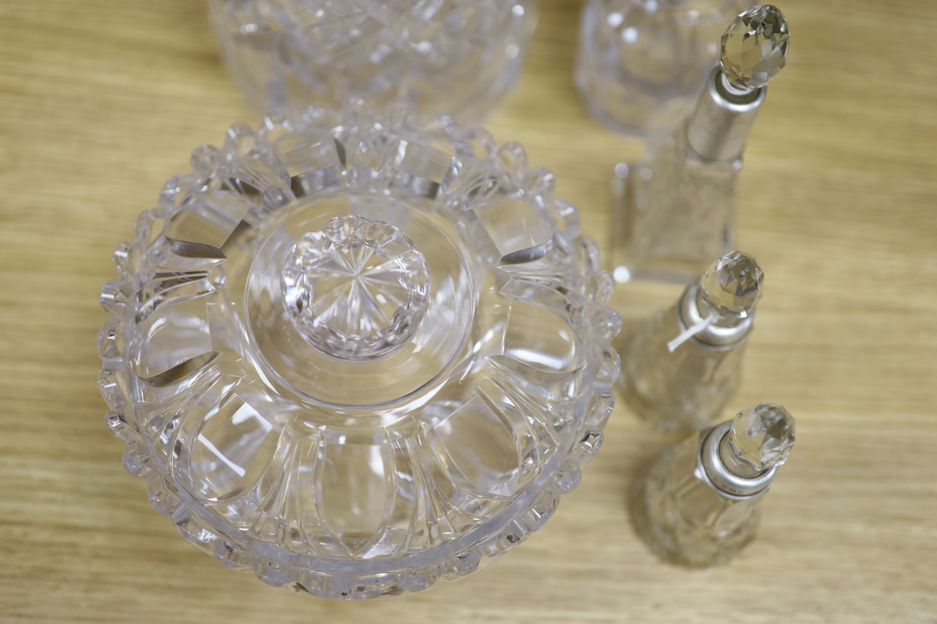 A pair of cut glass decanters, two others and mixed cut glass